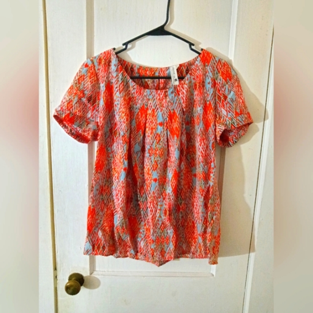 Woman's pink owl blouse